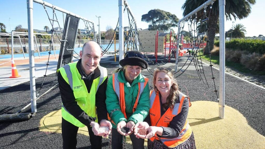 Numat marketing manager Jon Coursey, left, Francine Spencer, centre, and CPlay volunteer Roselyn Fauth at Timaru's under construction CPlay showing the recycled rubber matting for the playground. (AIMAN AMERFUL MUNER/ STUFF